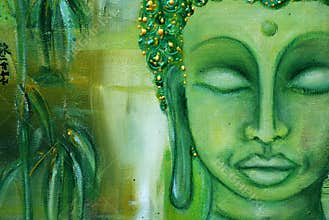 Buddha face on green