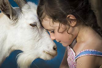 Young girl with goat