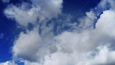 Time-lapse White Puffy Clouds with Clear Blue Sky (UltraHD 4K)