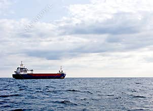 Cargo ship in ocean