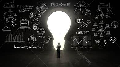 Businessman Standing in front of black, shape of bulb light, Business plan and various graph in black wall.