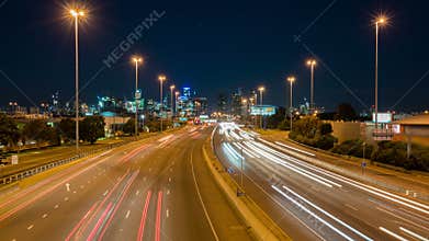 Hyperlapse video of highway traffic and cityscape