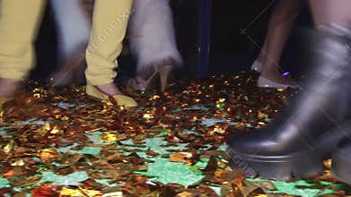 Beautiful dancing feet on gladness revelry party.