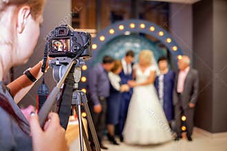 Girl the photographer at the wedding