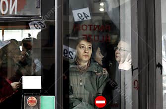 People in crowded bus
