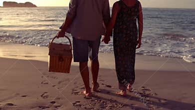 Cute senior couple holding hands