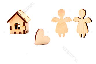 Wooden house, heart and angel.
