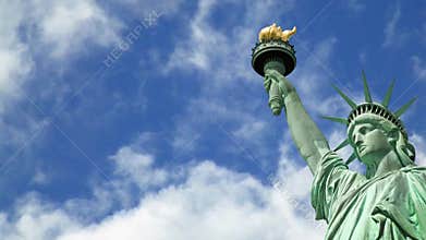 Seamless loop - Statue of liberty blue sky with moving clouds, HD video
