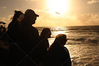 Friends at Sunset on the Ocean