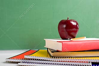 School Books and an Apple