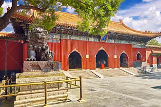 Bronze lion at the entrance to beautiful Yonghegong Lama Temple.