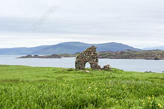 Stone gate, ruins Iona, ancient stone wall in Iona  the cradle of Scottish Christianity  Scotland.