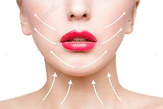 Portrait of young woman with arrows on her face