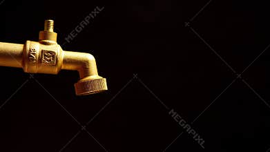 Dripping faucet on a black background