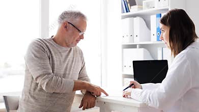 Senior man and doctor meeting at hospital 61