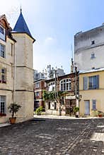 L`Ã®lot de la Reine Blanche is a collection of buildings located in the 13th arrondissement of Paris, near the Gobelins factory