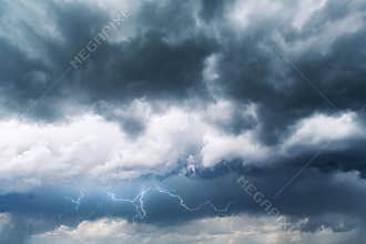 Dramatic storm clouds with rain