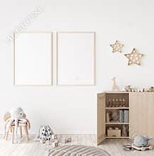 Mockup frame in minimal unisex child bedroom with natural wooden furniture