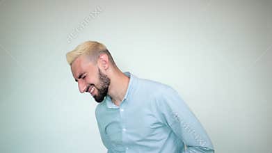 Man with blond hair, black beard over isolated white background shows emotions