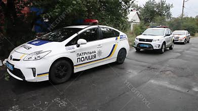 Police pursuit on highway. View of cop patrol car chasing a thief on red modern car driving away from the law.