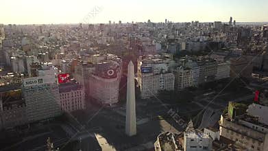 Aerial footage of iconic Obelisk in Buenos Aires, Argentina during golden hour
