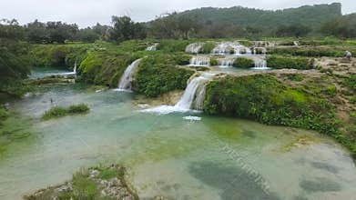 A surprising snapshot of the drone in the fall in Salalah, Ain Darbat, Sultanate of Oman