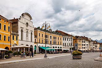 The Martiri square in summer cloudy day in Belluno, Italy