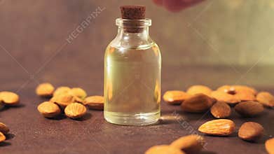 Almond oil in a rustic style selective focus. cosmetic oil