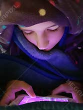 Wrap yourself in a blanket and read an interesting e-book.