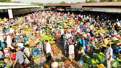 Areal view of vegetable market. People buying and selling vegetables