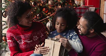 Daughter opens gift box prepared parents with love for Christmas
