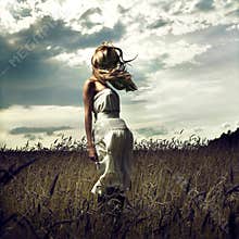 Jump women in wheat field