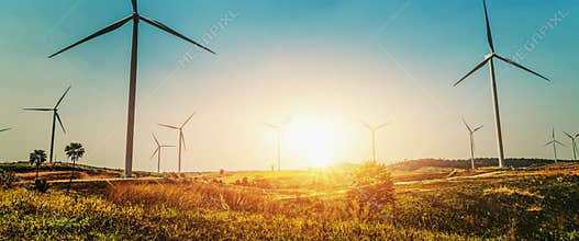 concept idea eco power energy in nature. wind turbine on hill and sunset