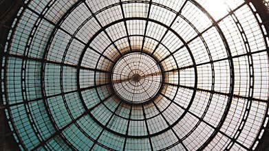 Milan, Italy - May 2019: Glass dome gallery Vittorio Emanuele. The concept of symmetry. All-round panorama