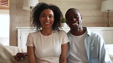 African couple webcam view making call talking with friend distantly