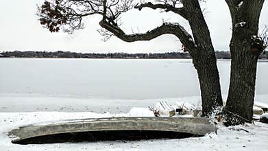 Upside Down Canoe by Lake, Winter, Snow, Tree