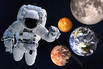 Astronaut near Planets of solar system together in space. Earth, Mars, Venus, Moon