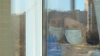 Young family shooting through the window