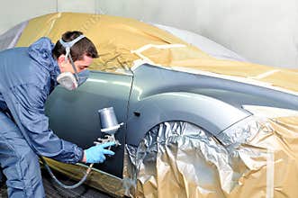 Worker painting.