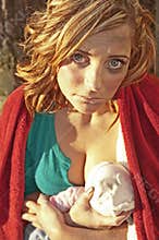 Mother breast feeding baby