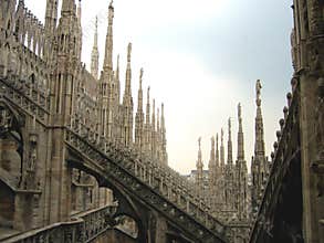 Fantasy city - Rooftops of Duomo Cathedral, Milan, Italy