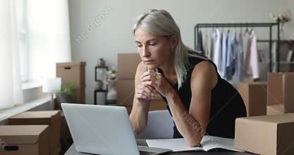 Woman buy goods for new house via e-commerce websites