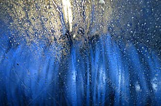 View Through Wet Windshield During Automatic Car Wash