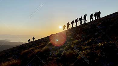 harmonious, regular and disciplined mountaineering walk of professional mountaineers