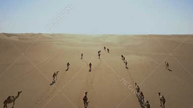 Aerial view of a caravan crossing a desert