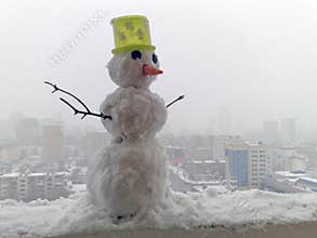 Snowman in the city