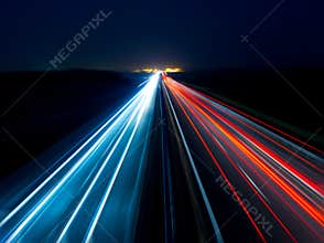 Blurry abstract photo of the lights of cars