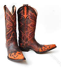 Leather cowboy boots on white background