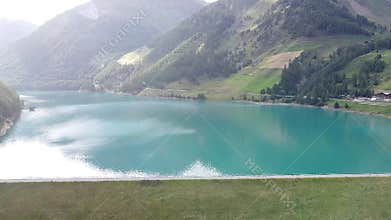 Lake Vernago reflecting the blue sky, Trentino Alto Adige, Italy