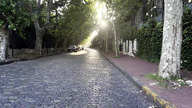 Urban street and city roads in a picturesque town. Travel through historic architecture and